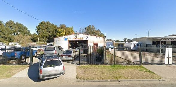 An Auto Repair Shop With Cars Parked Outside — Argenton Automotive Repairs In Boolaroo, NSW