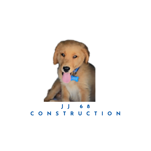 A puppy wearing a blue collar with a pink ball in its mouth