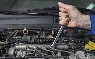 Mechanic with a Wrench — Auto Repair In Opelika, AL