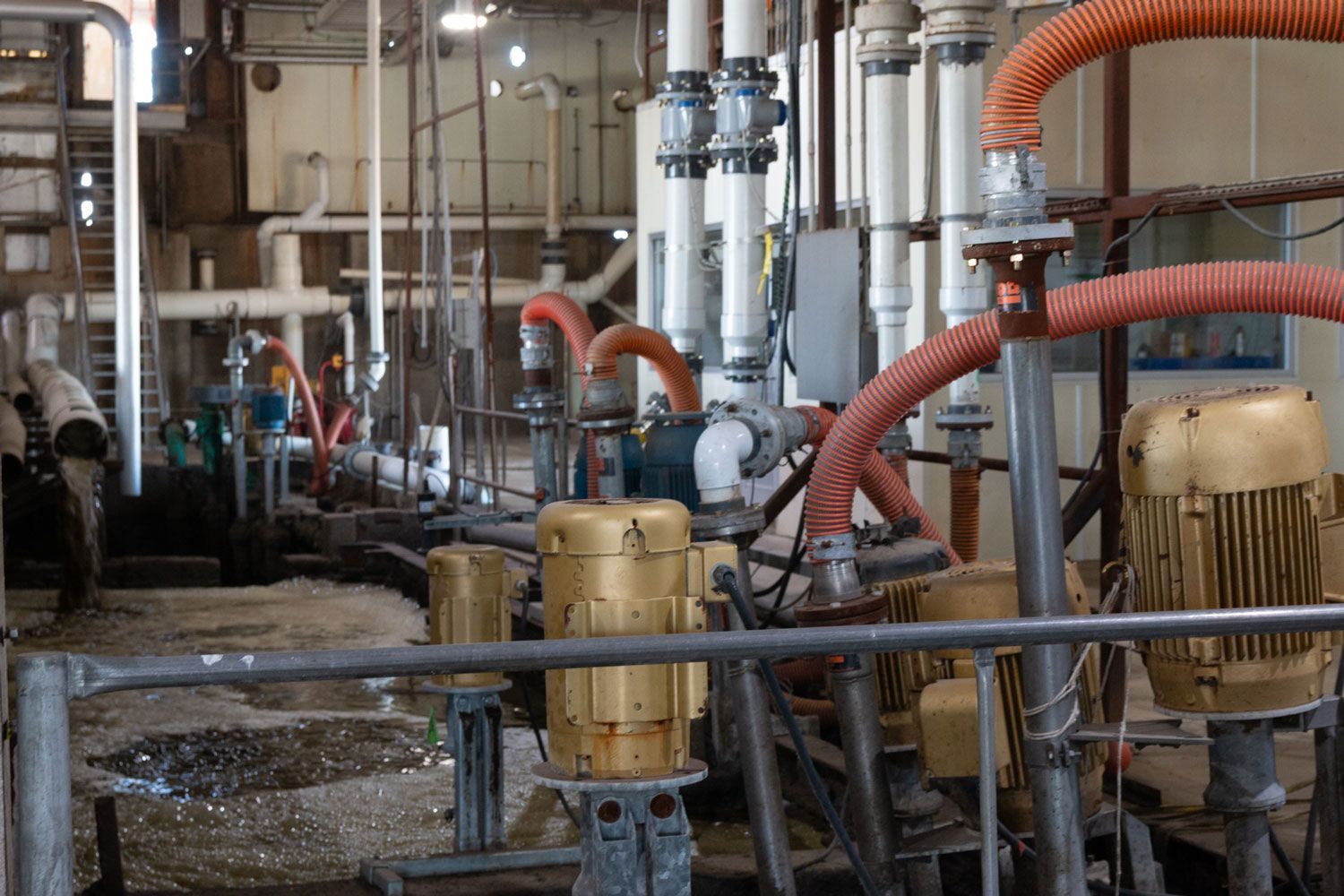A factory filled with lots of pipes and motors.