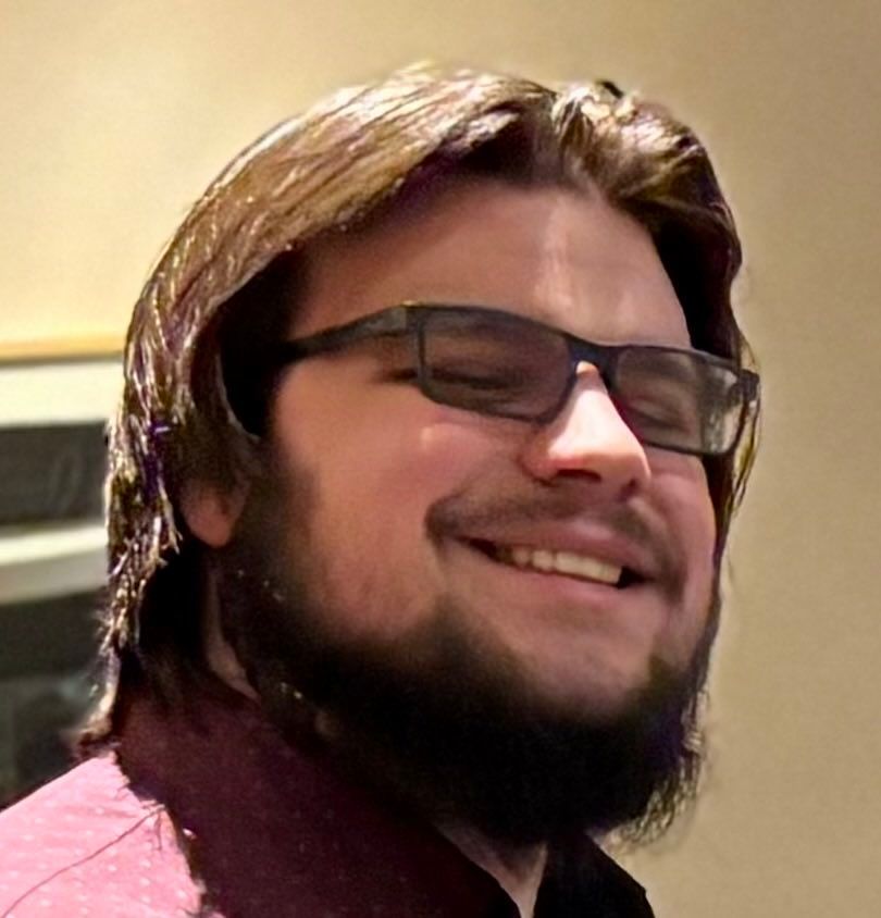 A pile of rocks with a black background