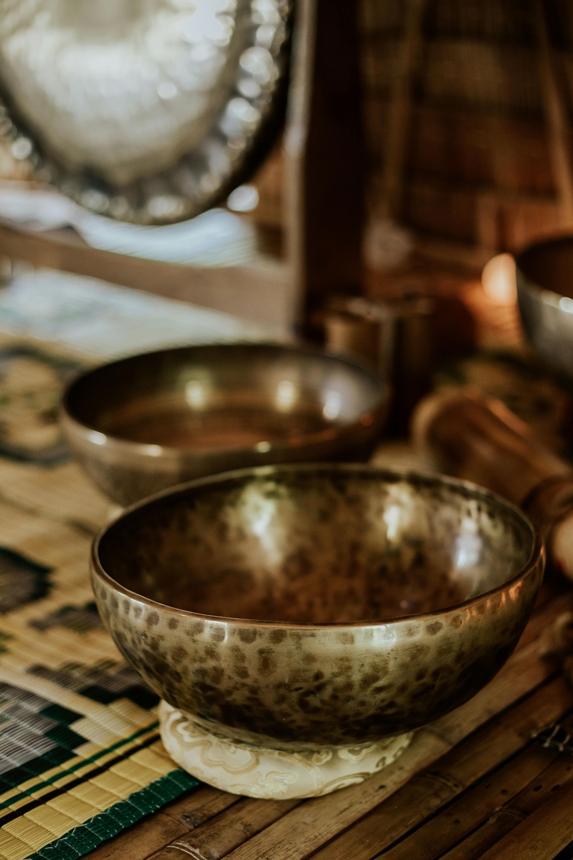 A group of bowls sitting on top of a wooden table.