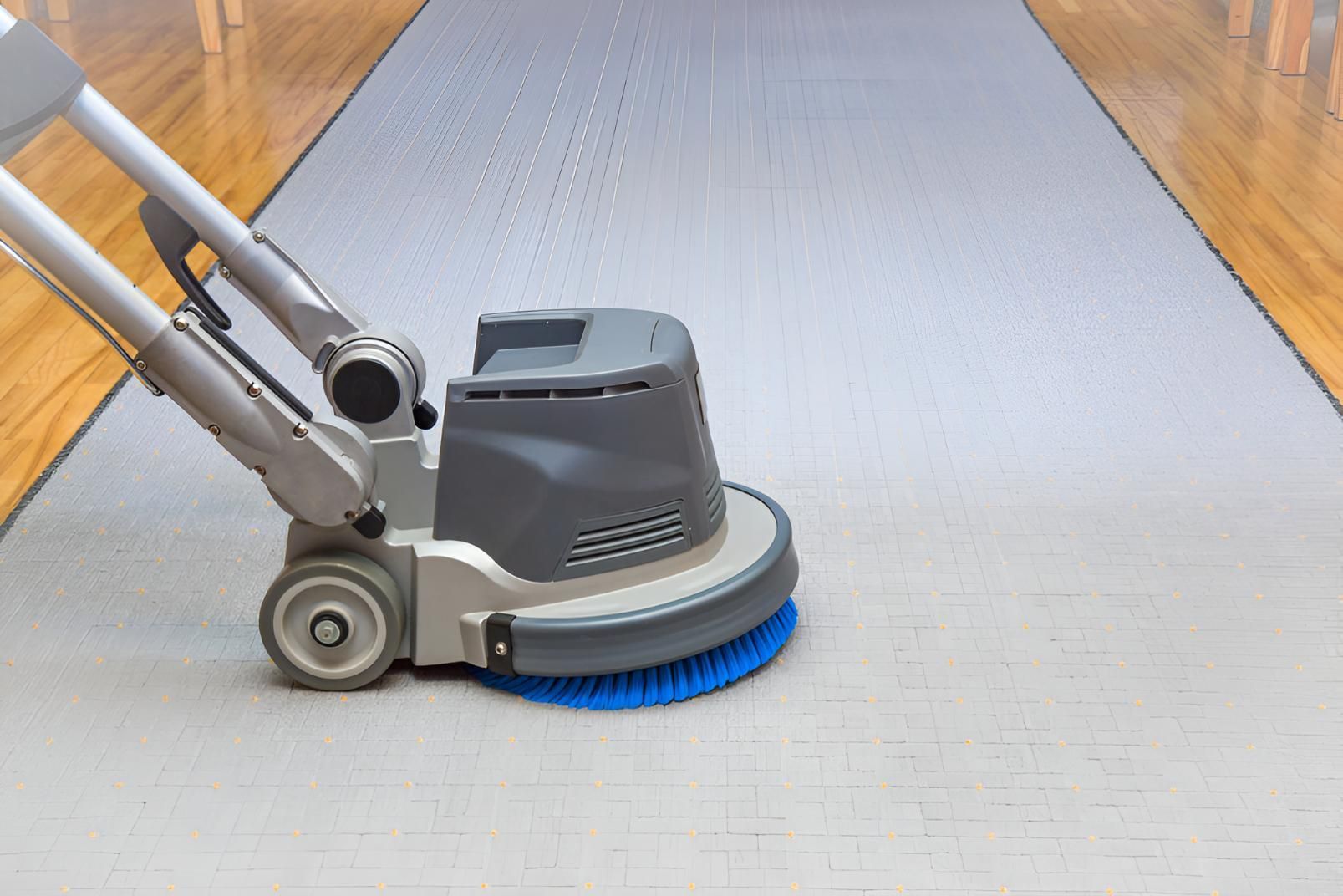 Machine is Cleaning a Carpet on a Wooden Floor — Mr Steam Clean Tweed Coast in Terranora, NSW