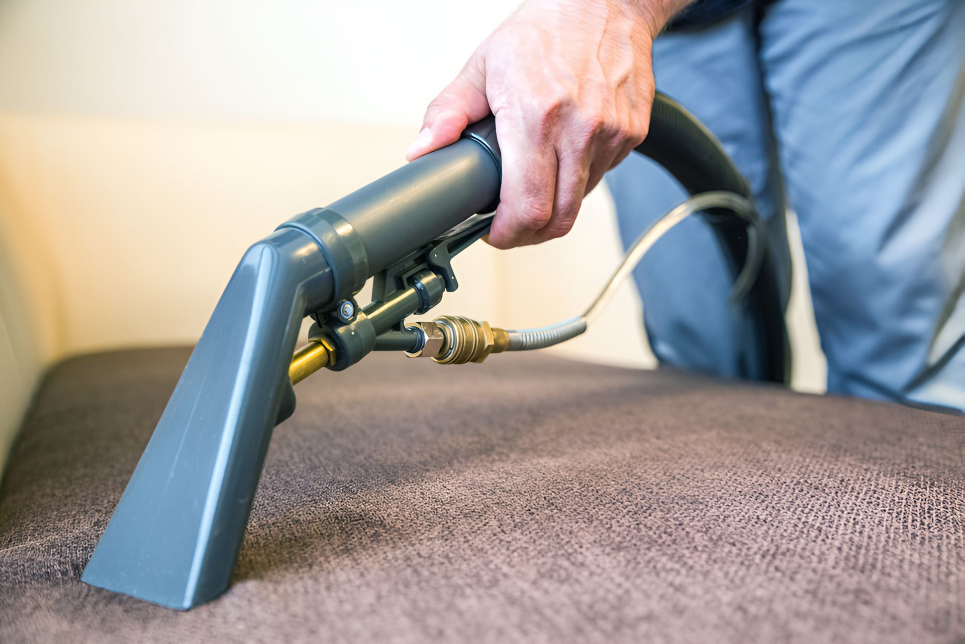Person is Using a Vacuum Cleaner to Clean a Carpet — Mr Steam Clean Tweed Coast in Northern Rivers, NSW