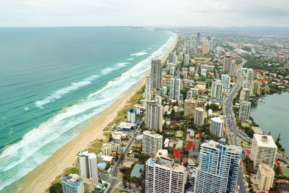 An Aerial View Of A City With A Beach And Ocean In The Background — Mr Steam Clean Tweed Coast In Coolangatta, NSW