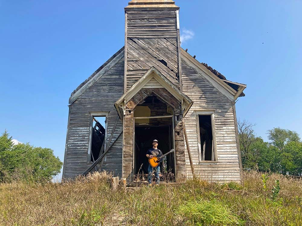 person, doorway, old church, architecture, blue sky, Kansas