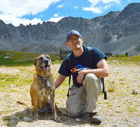 Cheyenne & Ryan in front of a mountain range