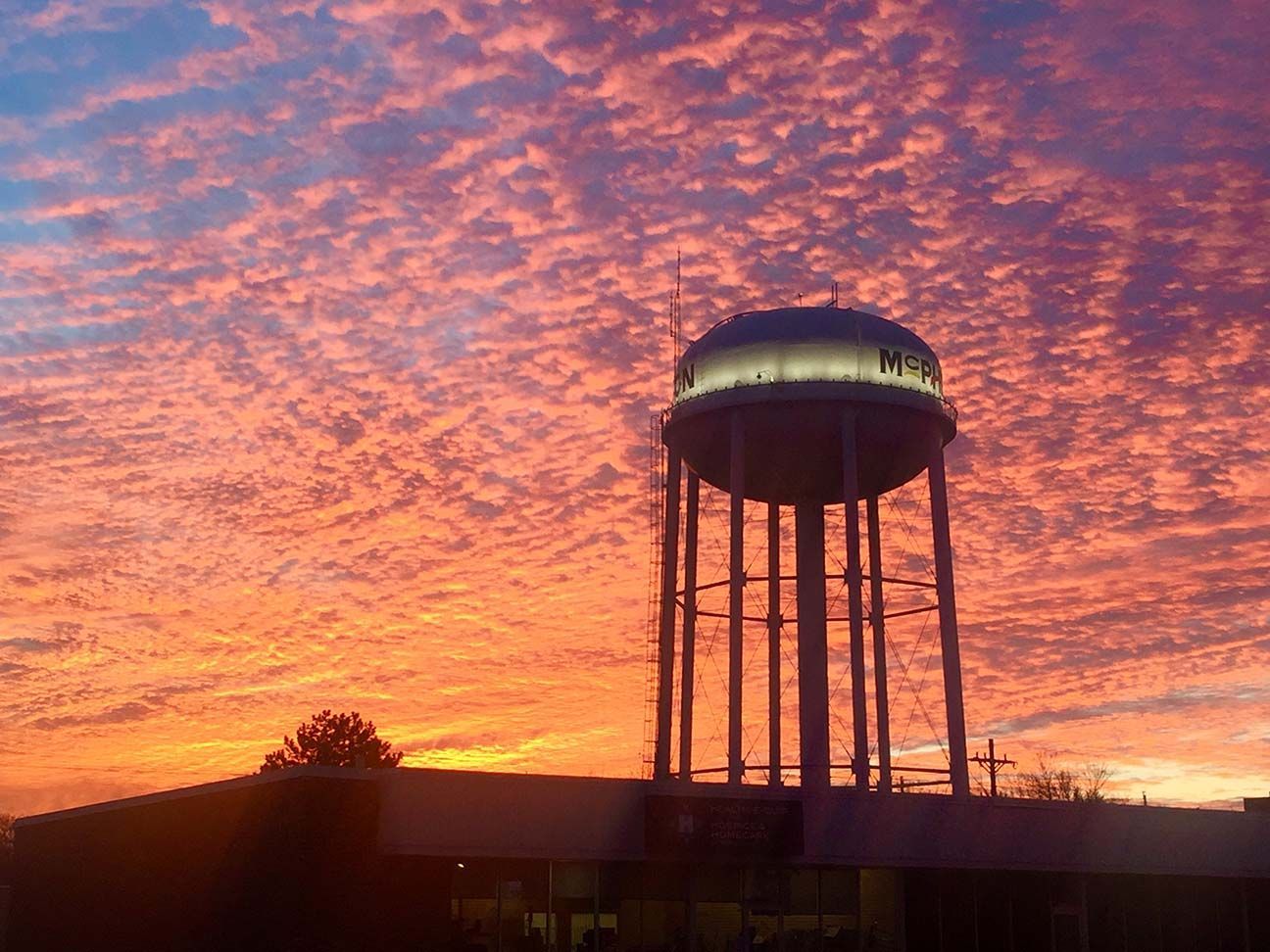 A waterpower in McPherson, Kansas is sihllouetted 