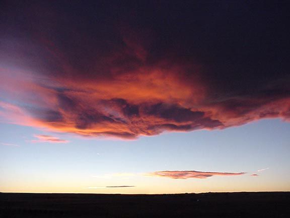 Dark red cloud hovering over the plains in Colorado 