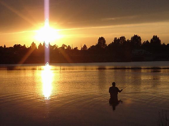 Fisherman sunset at Lake Absarraca in Cheyenne, Wyoming