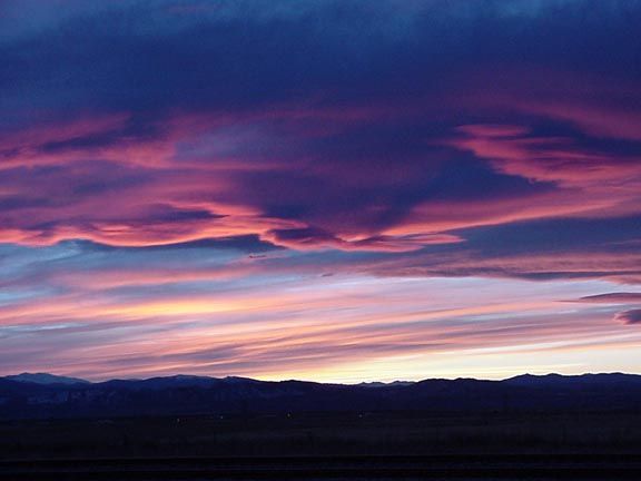 Deep blue and bright pink sunset along the northern Front Range of Colorado