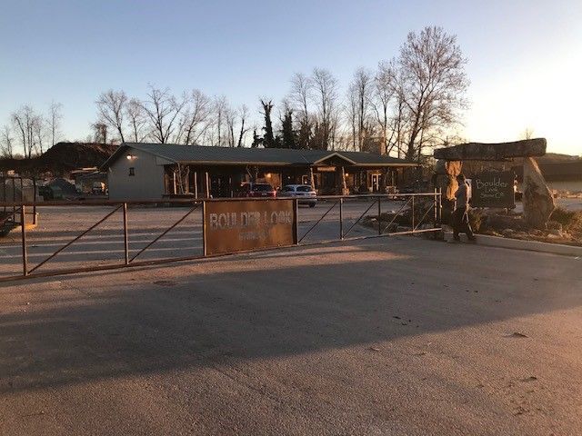 A building under construction with a sign that says sold out