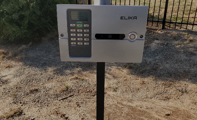 A close up of a keypad on a door lock.