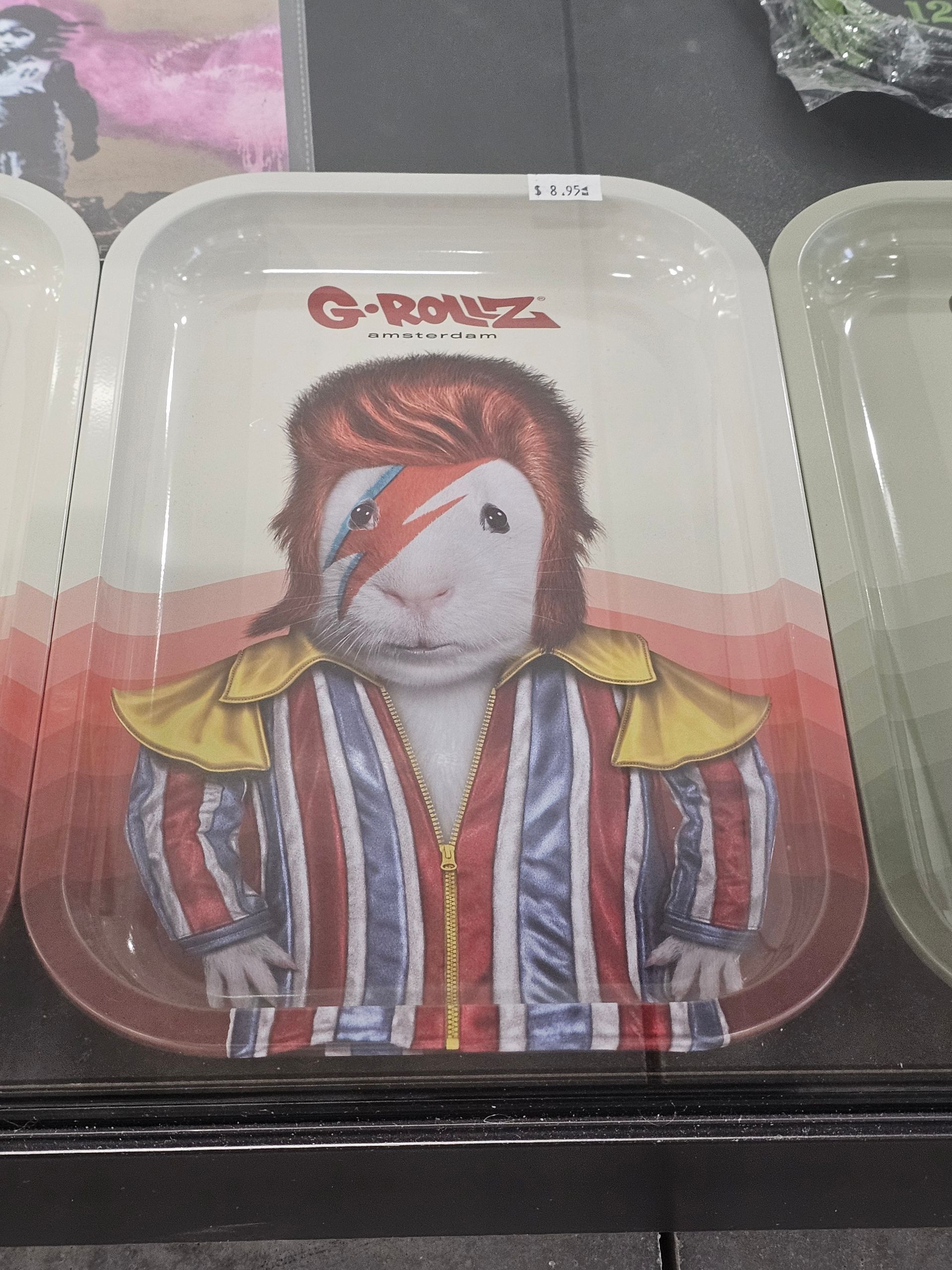 A display case filled with boxes of geek bar electronic cigarettes.