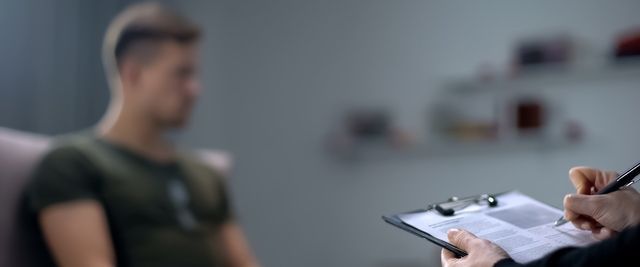 Man sitting with therapist — Pennington, NJ — Mary J Goepfert - MSW MPA LCSW LCADC