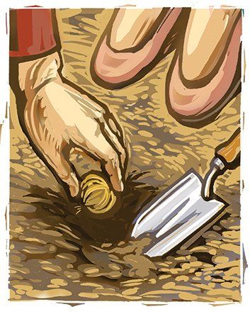 A person is digging a hole in the ground with a shovel.