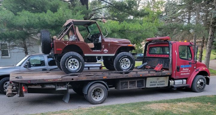 Brown Car On Truck - Rockford, MI - Nelson's Towing