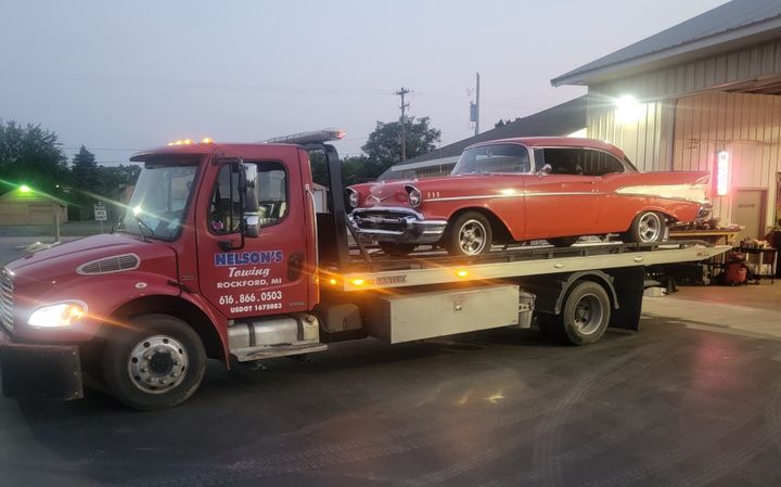 Truck Carrying Car - Rockford, MI - Nelson's Towing