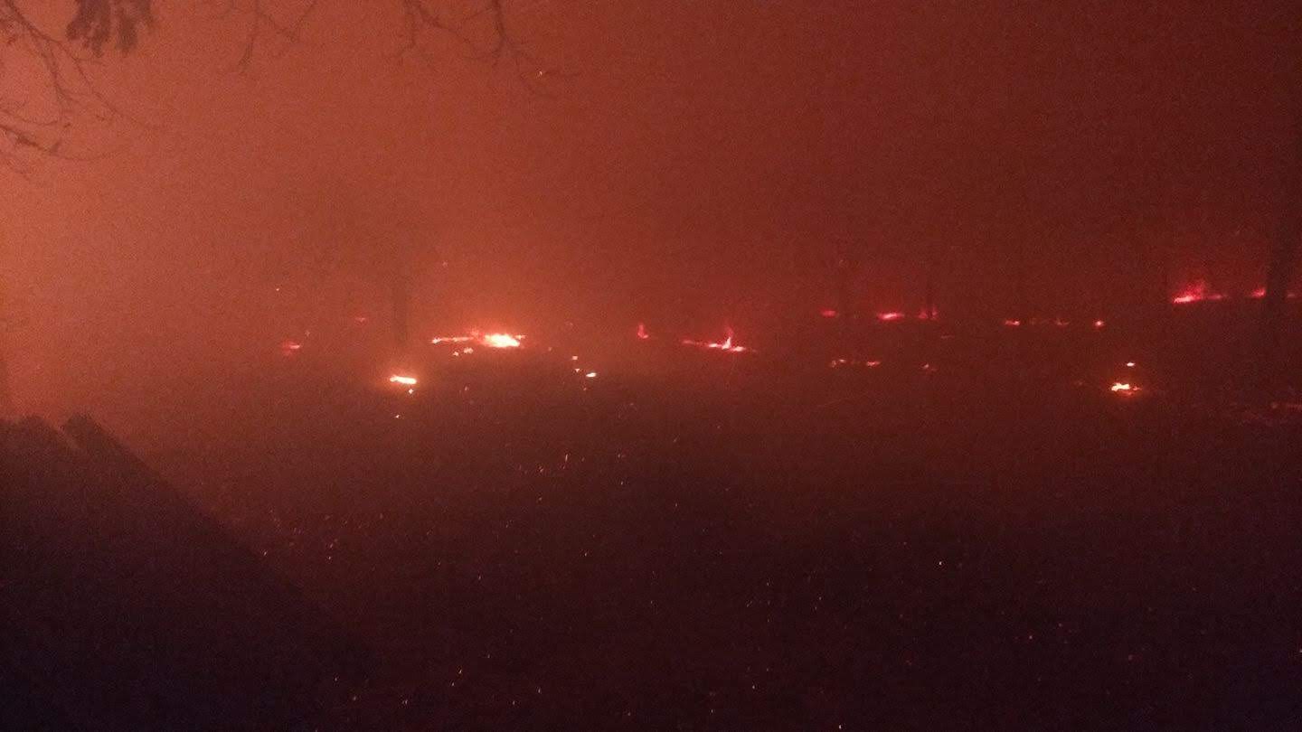 a view of the vineyard of Ancient Oak Cellars' Siebert Ranch burning, the night of the 2017 Tubbs wildfire