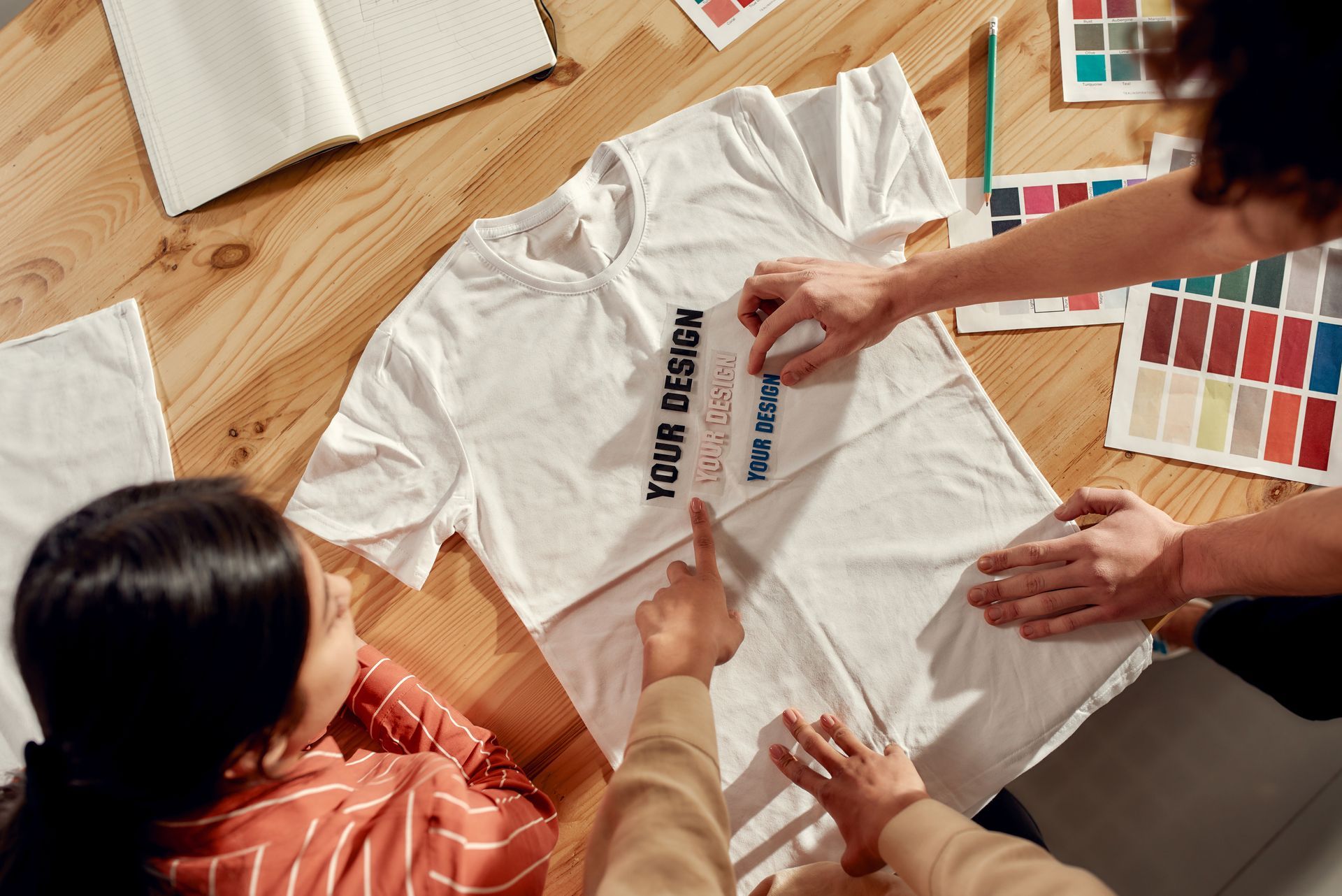 People designing a t-shirt