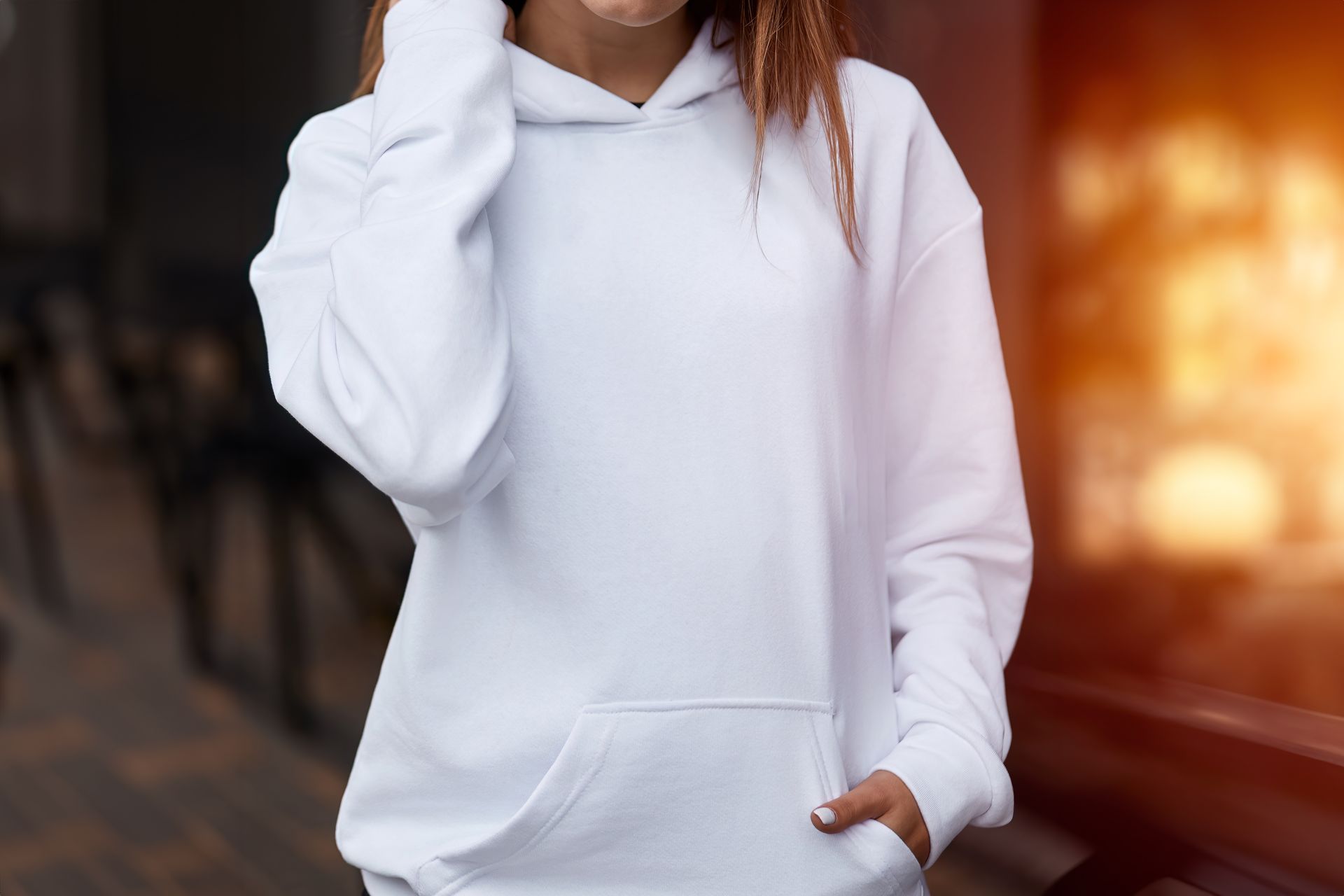 Woman in a white hoodie