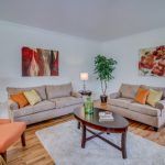 A living room filled with furniture and a coffee table.