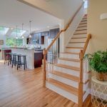 A wooden staircase leading up to the second floor of a house.
