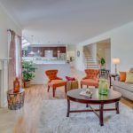 A living room filled with furniture and a coffee table.