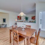 There is a table and chairs in the dining room.