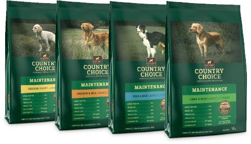 four bags of country choice dog food are sitting next to each other .