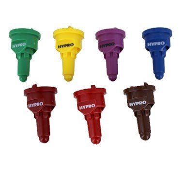 a bunch of different colored spray nozzles on a white background .