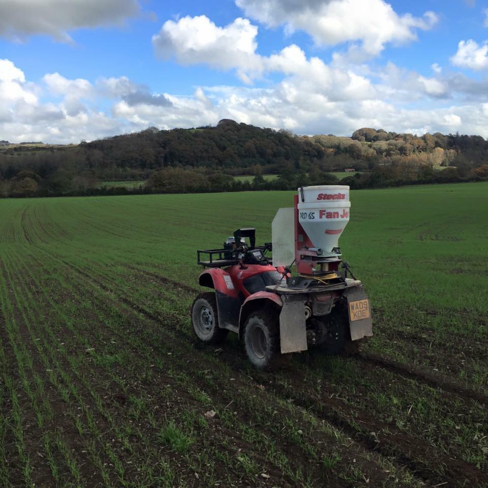 a red atv with a fan jet attached to it
