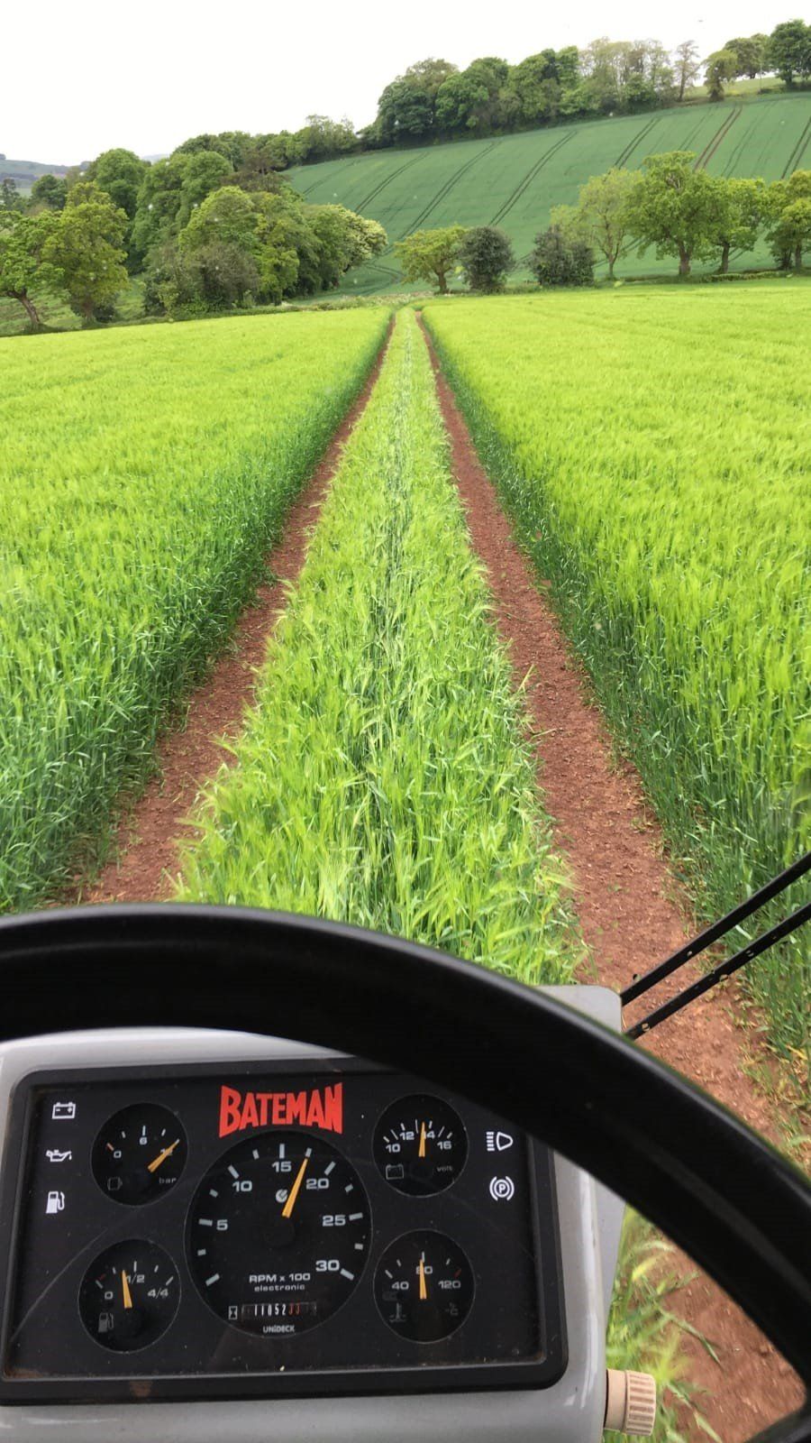the dashboard of a bateman tractor is shown