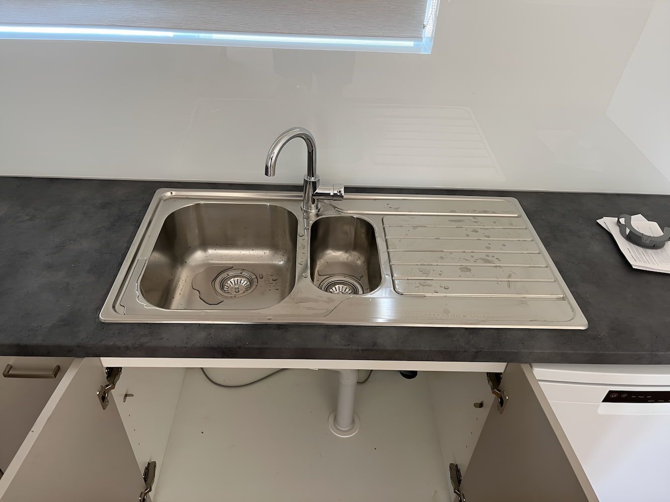 A Stainless Steel Sink is Sitting on Top of a Kitchen Counter — John Day Plumbing in Marlow Lagoon, NT