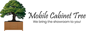 The logo for mobile cabinet tree shows a tree in a wooden box.