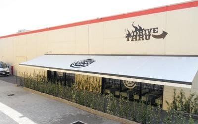 tenda per esterno di attività commerciale