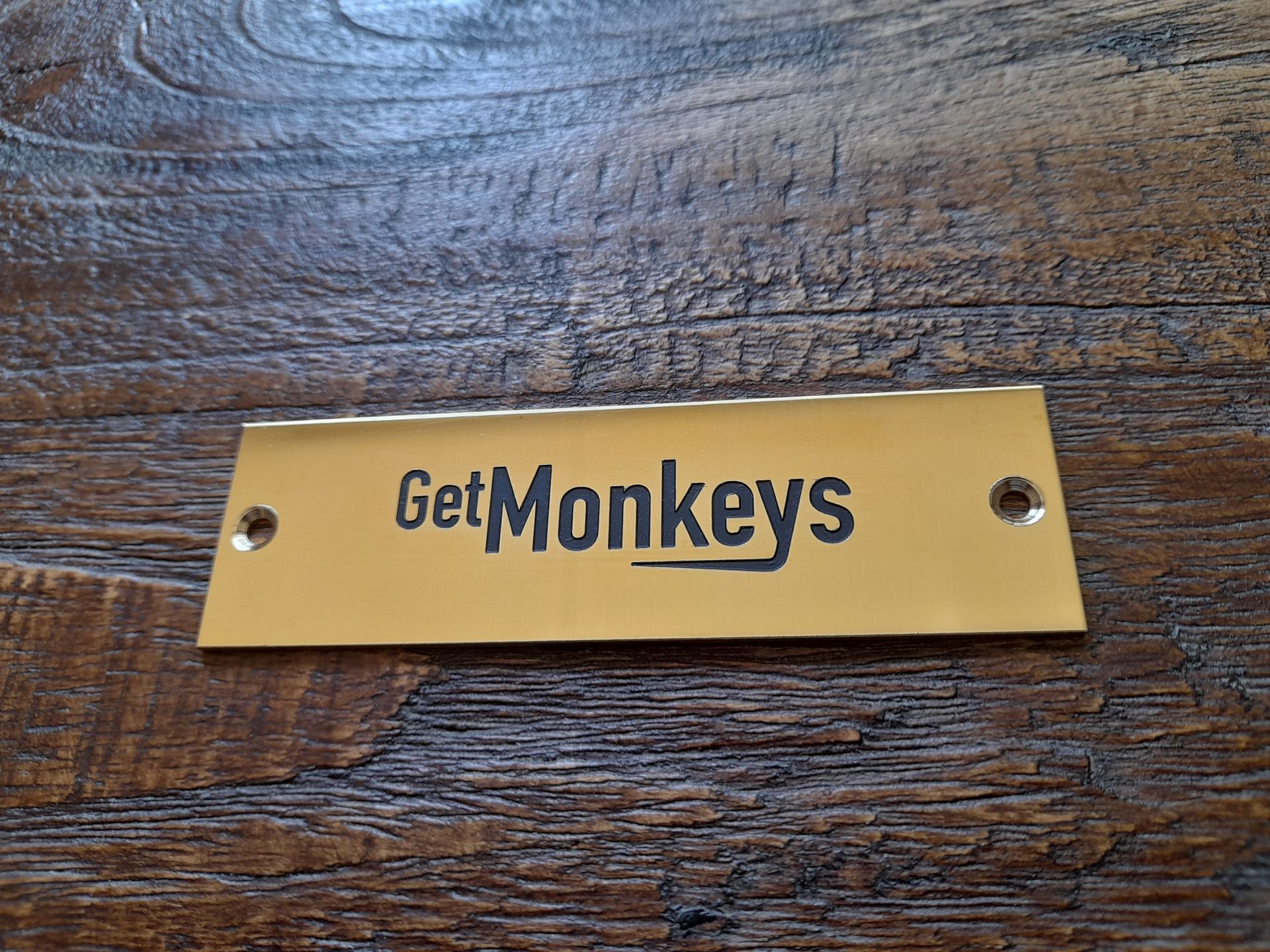 Messing bordje logo Naambordenservice Amsterdam