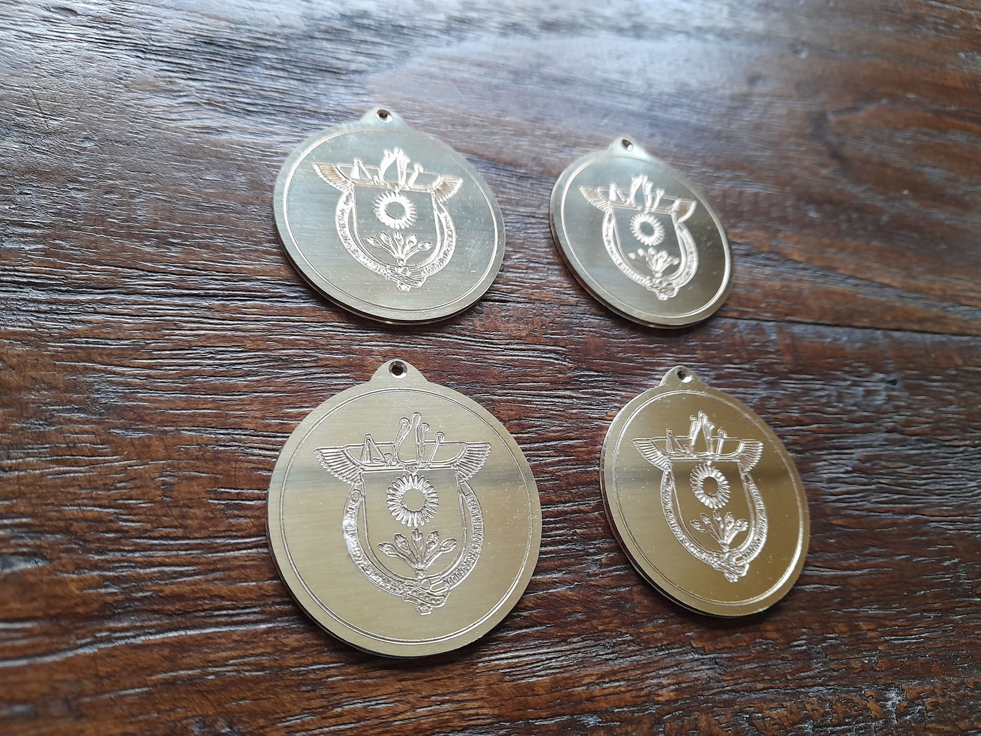 Messing penningen Naambordenservice Amsterdam