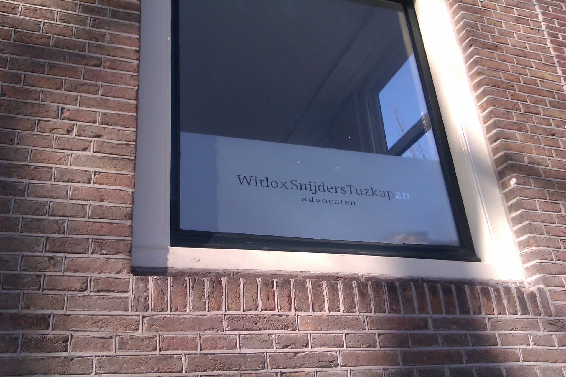 Grijs transparante raamfolie Naambordenservice Amsterdam