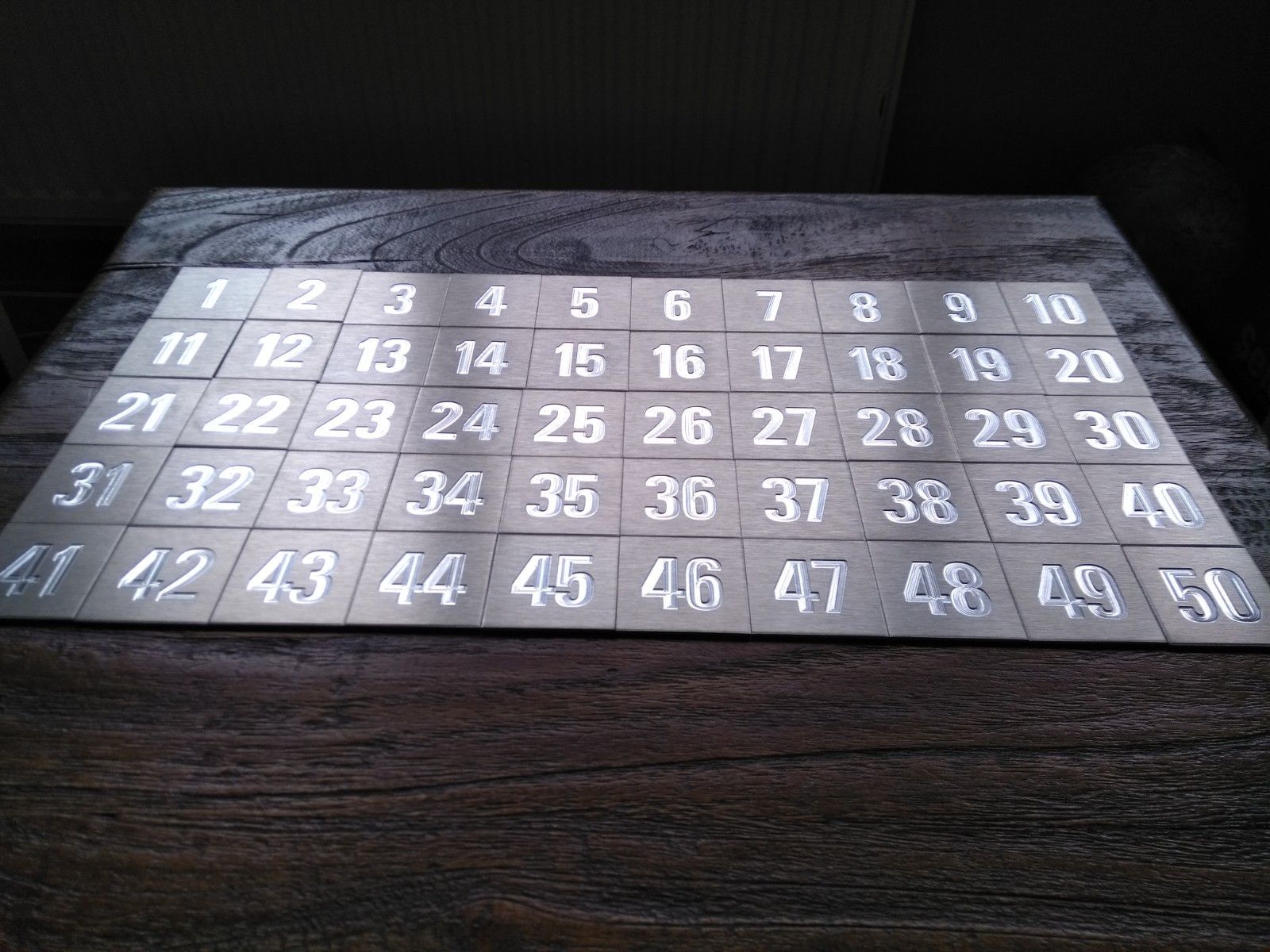 Gegraveerde tafelnummers Naambordenservice Amsterdam