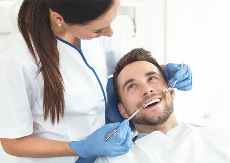 Dentist Doing Dental Checkup — Alliance, OH — Kristine Sigworth, DDS