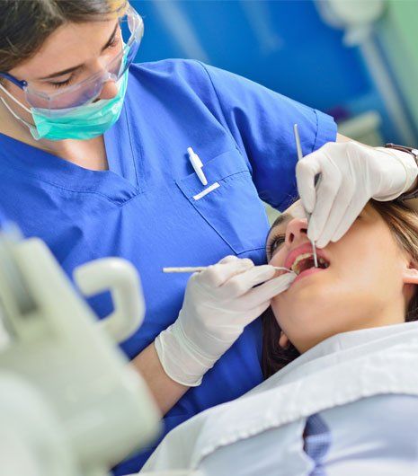 Dentist Checking Girl's Teeth — Alliance, OH — Kristine Sigworth, DDS