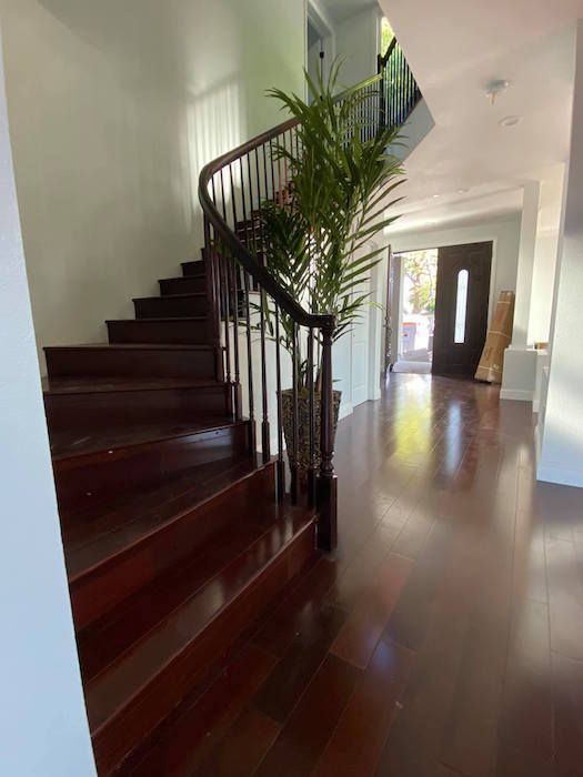 There is a spiral staircase in the middle of the room.