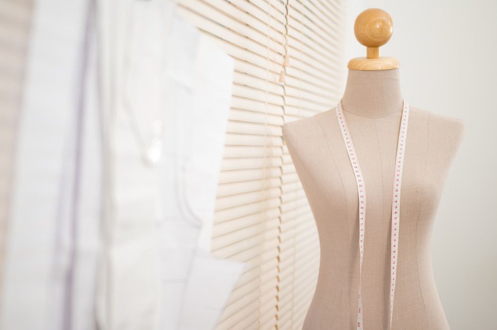 A Mannequin With A Measuring Tape — Shop Fittings Office Furniture Materials Handling In Gosford, NSW