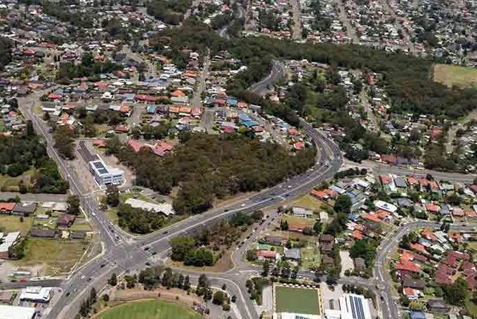 An Aerial View Of A Residential Area With Lots Of Houses And Trees — Shop Fittings Office Furniture Materials Handling In Macquarie Park, NSW