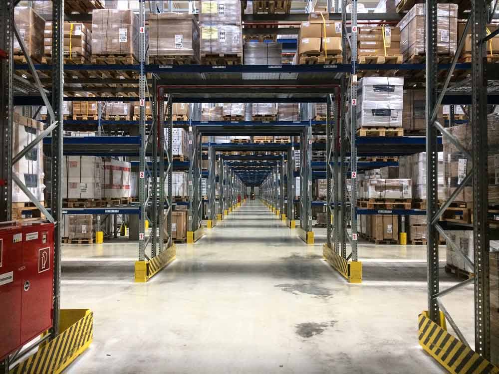 A Large Warehouse Filled With Lots Of Shelves — Shop Fittings Office Furniture Materials Handling In Gosford, NSW