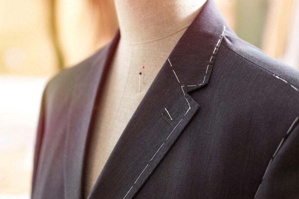 A Close Up Of A Suit Jacket On A Mannequin — Shop Fittings Office Furniture Materials Handling In Gosford, NSW