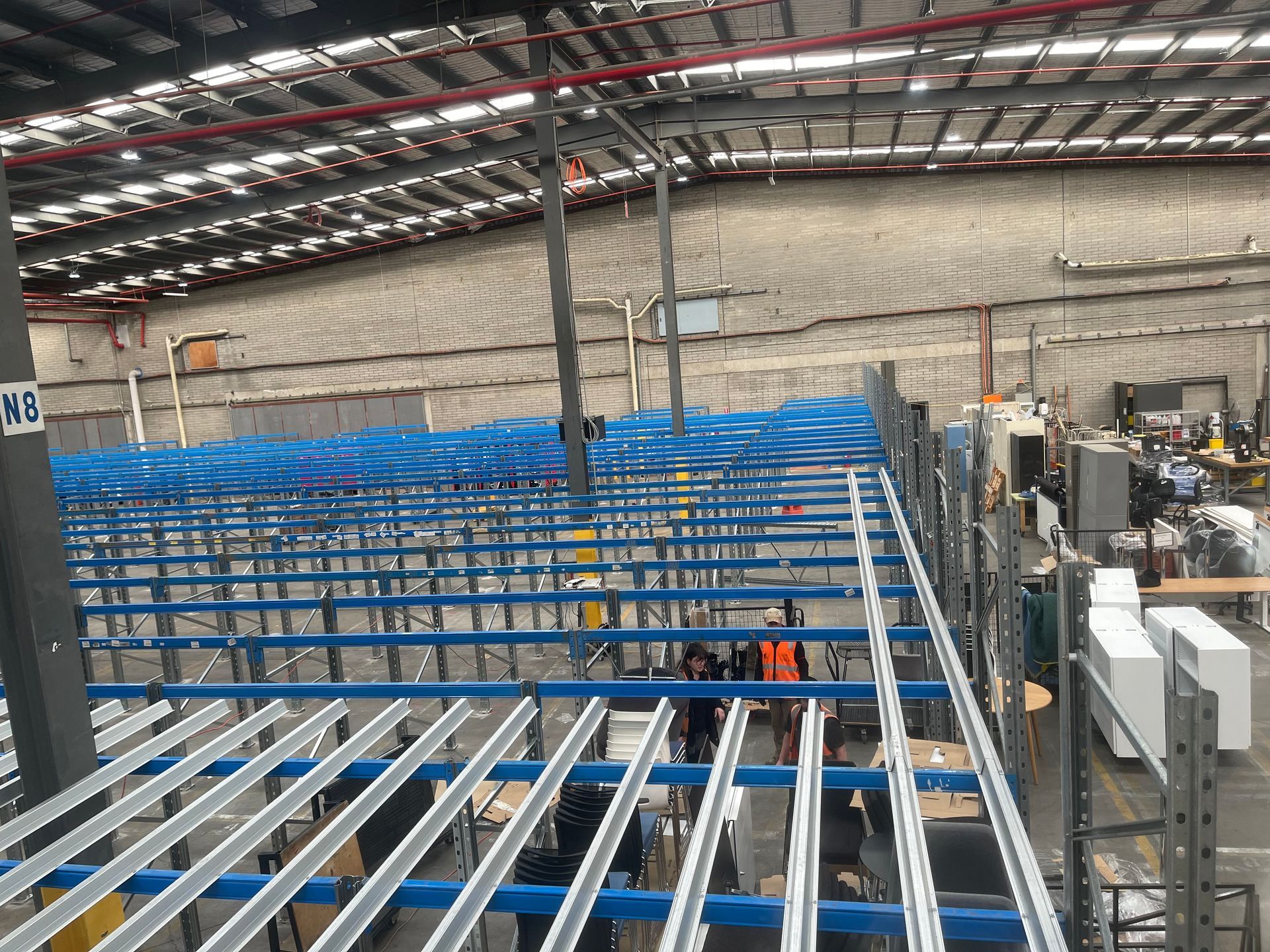 A Large Empty Warehouse — Shop Fittings Office Furniture Materials Handling In Gosford, NSW