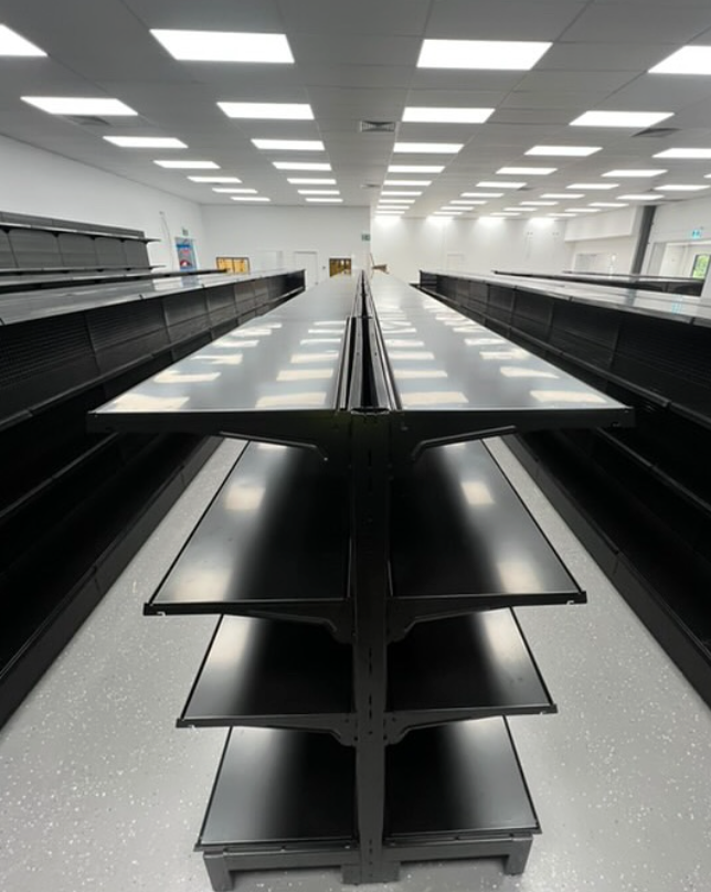 A Large Warehouse Filled With Lots Of Boxes — Shop Fittings Office Furniture Materials Handling In Gosford, NSW