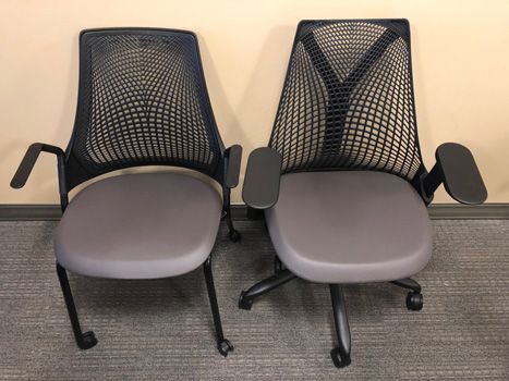 Two Chairs Are Sitting Next To Each Other — Shop Fittings Office Furniture Materials Handling In Gosford, NSW